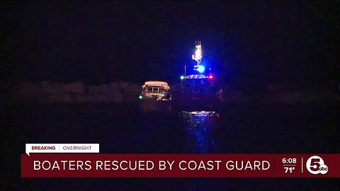 Boaters rescued by Coat Guard after crashing into break wall