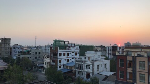 Sun Sets over Rooftop