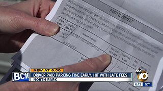 Driver hit with late parking fees