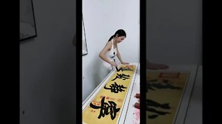 Beautiful Chinese Girl Has The Perfect Touch For Calligraphy