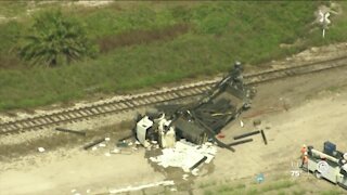 3 hurt after train hits truck in western Palm Beach County