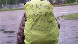 She walked five days in the rain to raise awareness around mental health. She's got weeks to go.