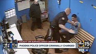 Phoenix officer charged with assault for slapping handcuffed man