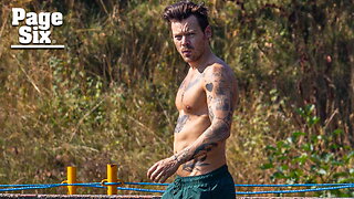 Shirtless Harry Styles shows off ripped abs while going for swim during London heatwave