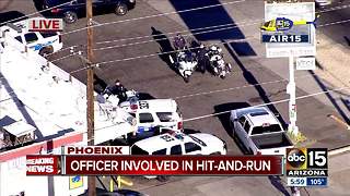 Suspect at large after hitting Phoenix motor officer