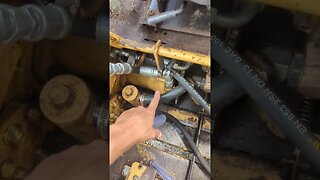 fixing hose on skid steer