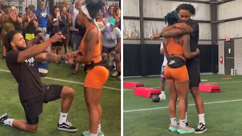 Fitness trainer gets surprised with proposal from best friend