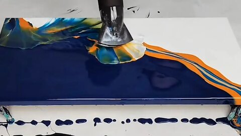 Orange and Blue Hairdryer Pour