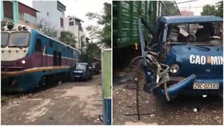 Truck destroyed by moving train