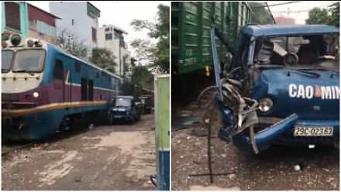 Truck destroyed by moving train