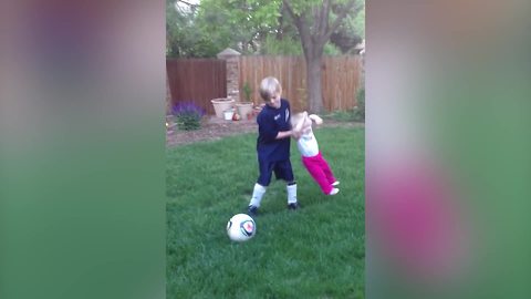 Adorable Tot Girl Learns How To Play Soccer