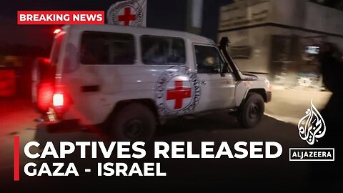 Captives released from Gaza cross over into Israel
