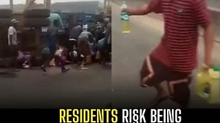 Residents risk being ‘barbecued’ as they troop out scoop petrol from a fallen tanker in Warri