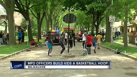 Milwaukee police officers buy basketball hoop, throw block party for kids