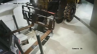 Thieves steal ATM using a forklift