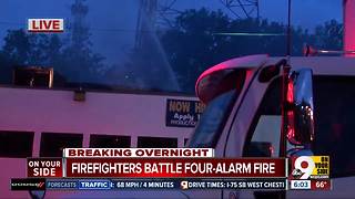 Firefighters battle four-alarm fire in Walnut Hills