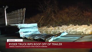 Roof ripped off box truck closing Amsdell Road in Hamburg