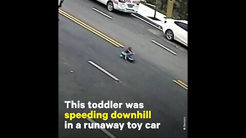 Fast Running Toddler on Road is Saved By Fireman