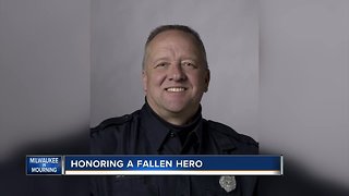 'We will never ever forget Mike': Family of fallen MPD officer honors him with police band concert