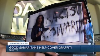 Good Samaritans help cover graffiti