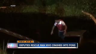 Dramatic rescue video and 911 call released of driver rescued out of sinking car