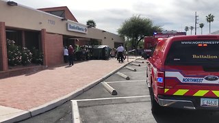 Vehicle crashes into banking complex on northwest side