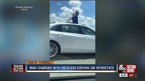 WATCH: Fla. driver caught standing through moon roof