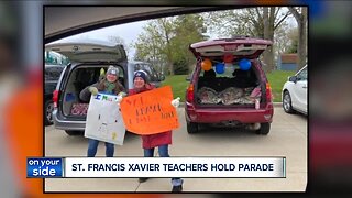 Teachers from St. Francis Xavier School in Medina hold parade for students