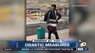 Woman wears 5 lbs. of clothes to avoid baggage fee?