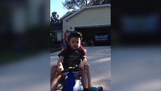 Two Kids On A Scooter Knocks Off The Camera