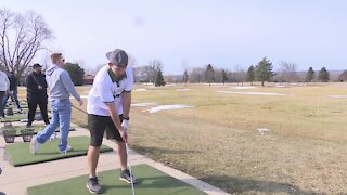 Golfers enjoy warmer weather