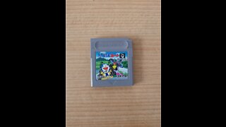 Doraemon Kart Race as Nobita or one of the gang. Loaded in Nintendo Game Boy Pocket Silver Border Console