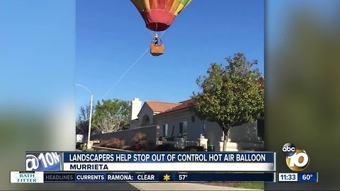 Landscapers stop hot air balloon