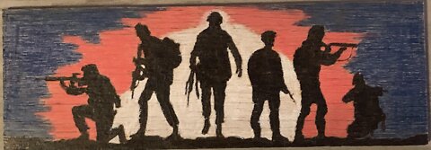 Soldiers silhouette wood burn
