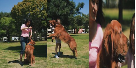 Mother and Daughter Petting a Dog