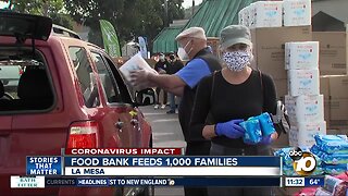 Vehicles gather at Grossmont Center for food giveaway