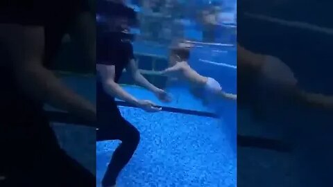 Training Of A Baby To Swimm