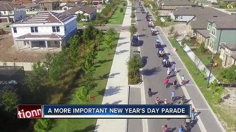 Pasco neighborhood throws New Year's Day parade to honor girl with leukemia