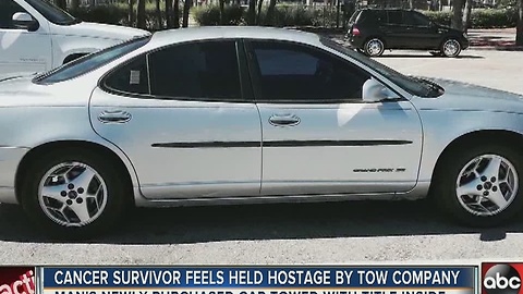 Cancer survivor fights to free car from towing impound