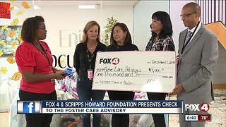 Fox 4 & the Scripps Howard Foundation present a check to the Foster Care Advisory in Fort Myers