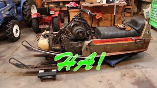 Vintage rotary powered snowmobile gets custom exhaust.