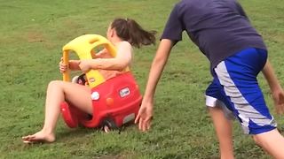 Teen Girl Pushed In Toy Car Falls Over