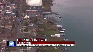 Police officer in kayak rescues woman from sinking car in Detroit River