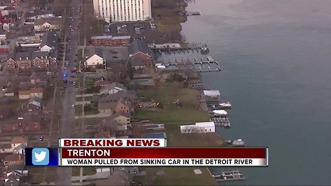 Police officer in kayak rescues woman from sinking car in Detroit River