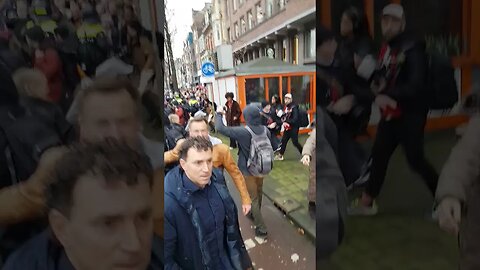 Protestors and Riot Police Clash in Amsterdam Over COVID Lockdowns and Mandates