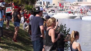 Fans cheer on the Bucs at boat parade