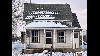 Old house turns out to be a log cabin!