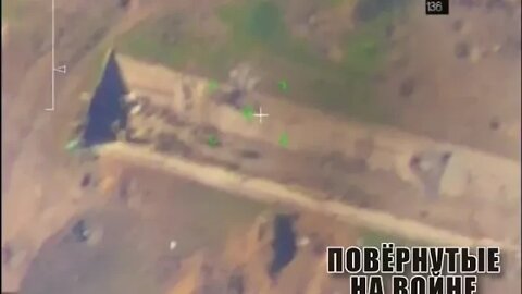 Russian artillery eliminates Ukrainian soldiers holding in a ditch.