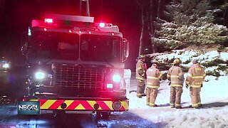 One woman sent to hospital after a house fire in Shawano