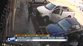 Surveillance cameras catch thief stealing from car